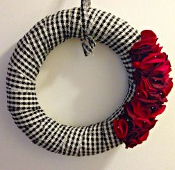 My DIY Alabama/USC wreath. Pardon the lighting as it's currently hanging in a dark hallway leading to the garage. 